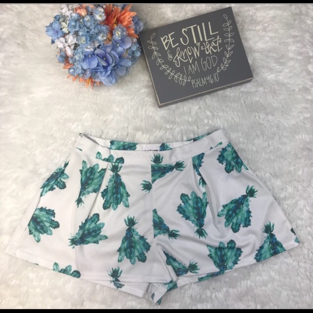 Sold Ethan and cocoa leaf print shorts